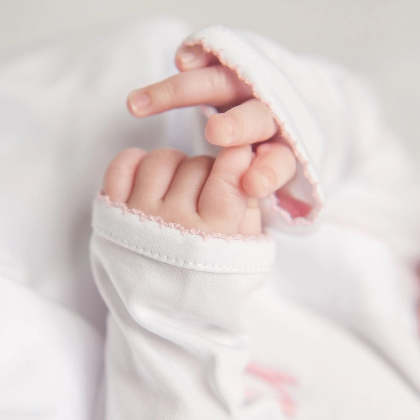 Essentials White with Pink Trim Footie